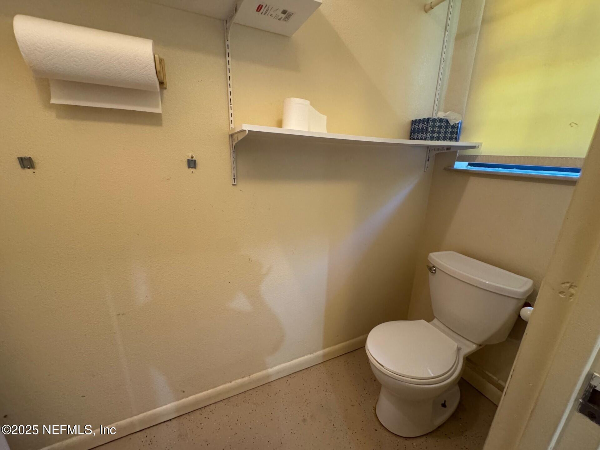 229 Davis Lake Road Palatka, FL 32177 - Photo 37 of 73 a white toilet sitting next to a sink