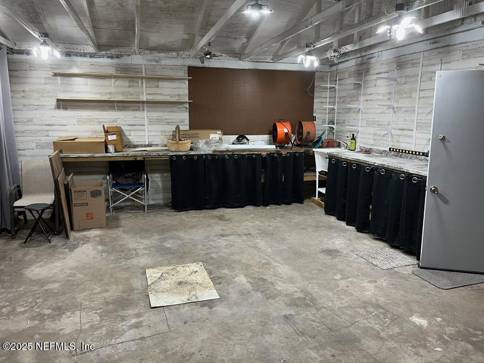 229 Davis Lake Road Palatka, FL 32177 - Photo 51 of 73 a room with furniture and a flat screen tv