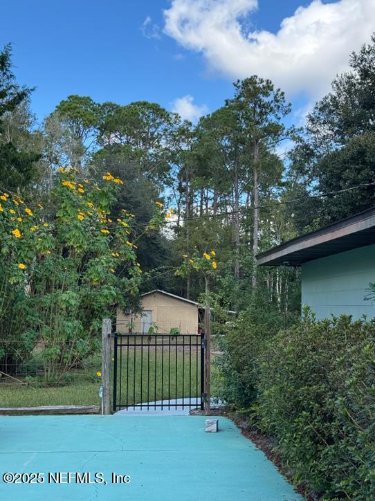 229 Davis Lake Road Palatka, FL 32177 - Photo 67 of 73 a view of a house with a small yard