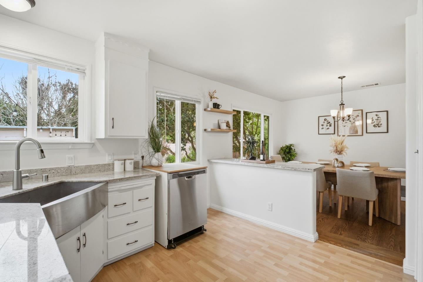 76 Georgia Way San Leandro, CA 94577 - Photo 14 of 32 a kitchen with cabinets a sink and appliances in it