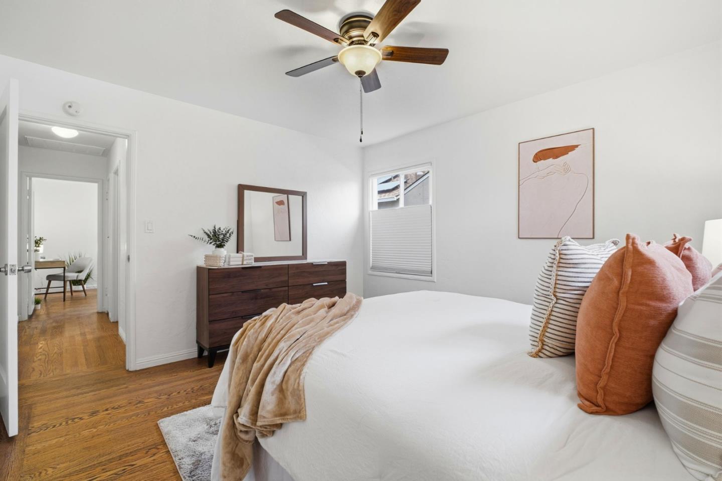 76 Georgia Way San Leandro, CA 94577 - Photo 19 of 32 a bedroom with a bed and a chandelier