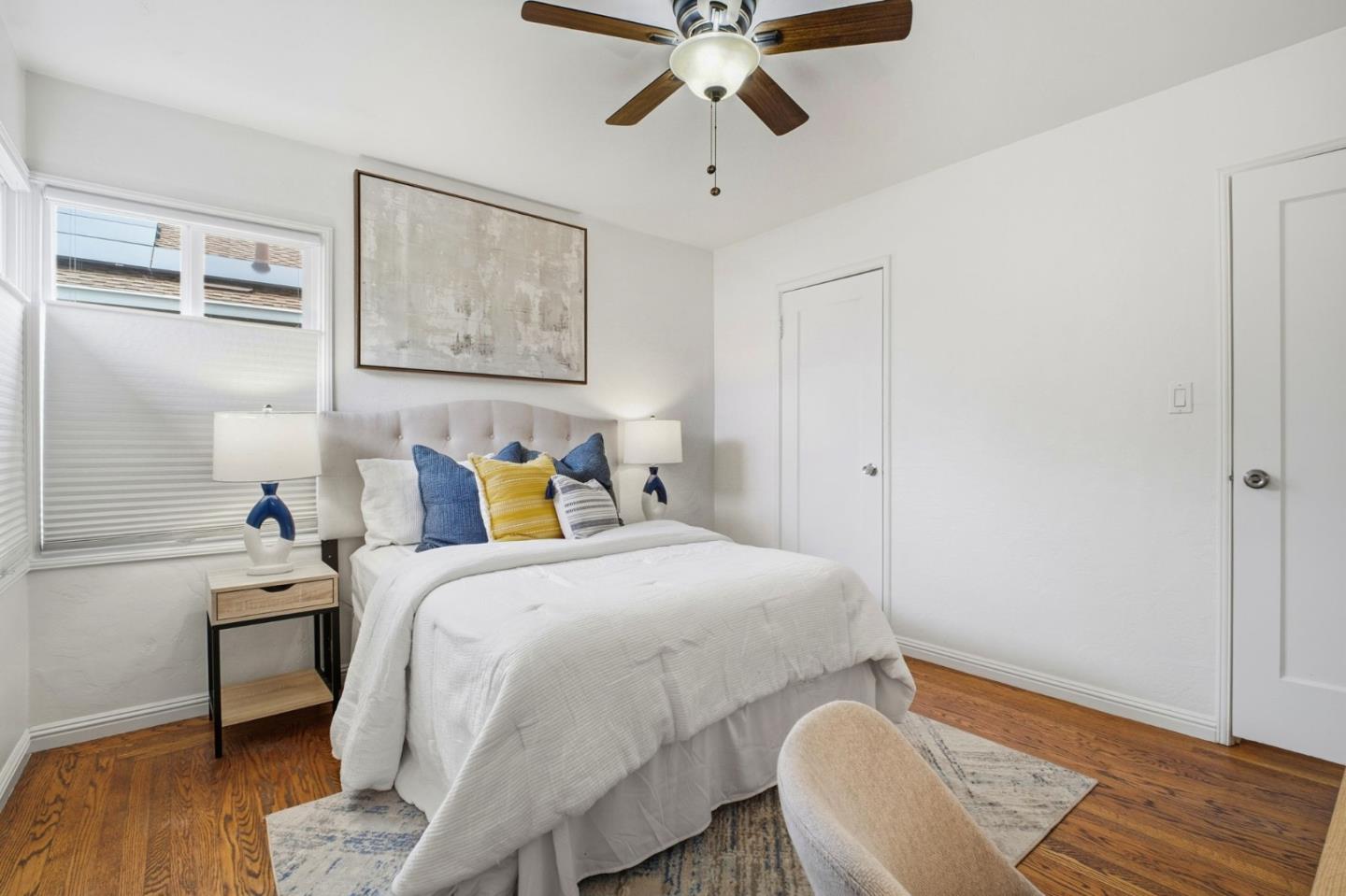 76 Georgia Way San Leandro, CA 94577 - Photo 23 of 32 a bedroom with a bed and wooden floor