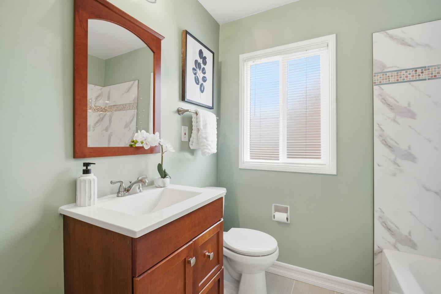 76 Georgia Way San Leandro, CA 94577 - Photo 25 of 32 a bathroom with a sink and a mirror