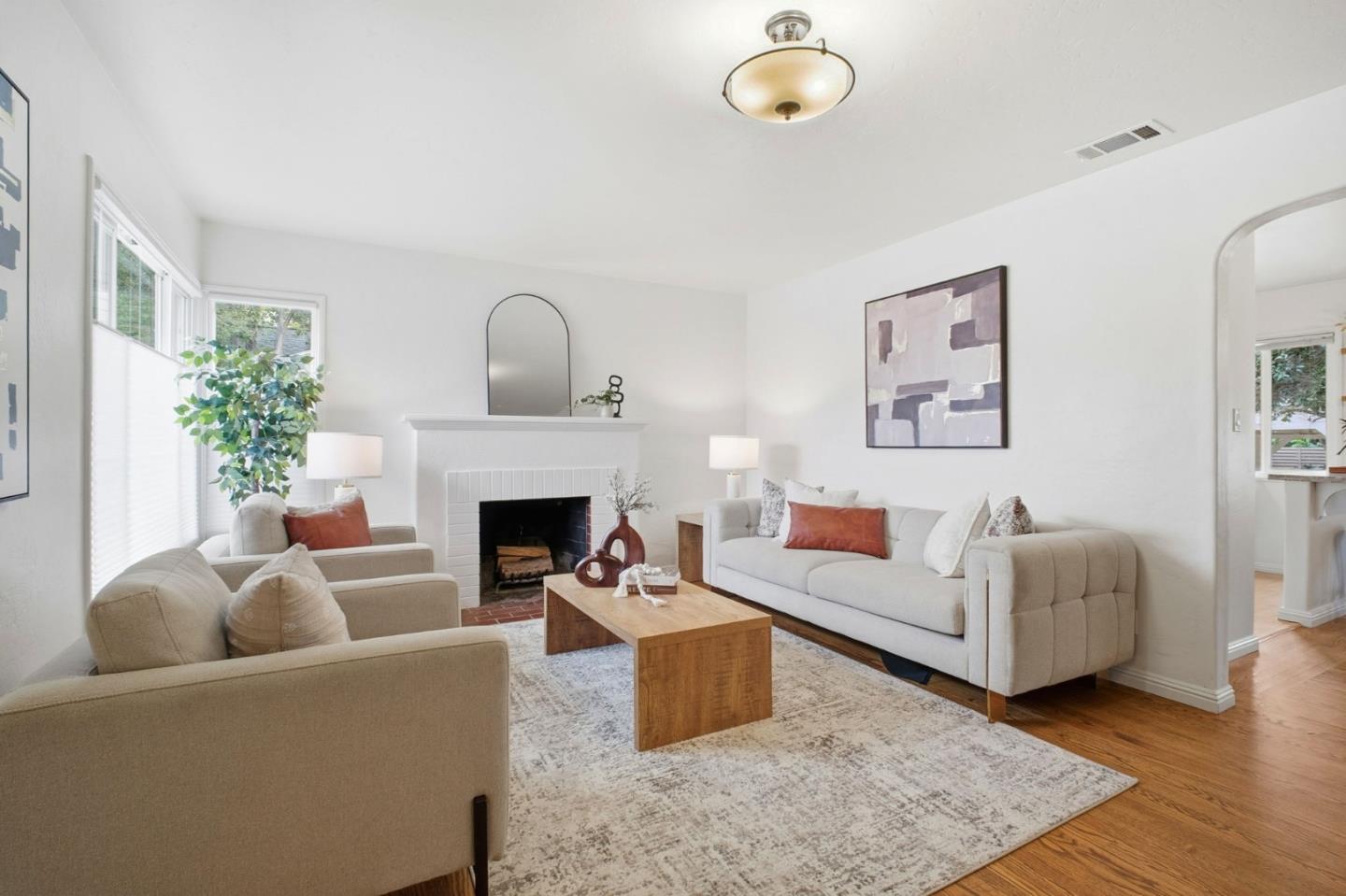 76 Georgia Way San Leandro, CA 94577 - Photo 8 of 32 a living room with furniture and a fireplace