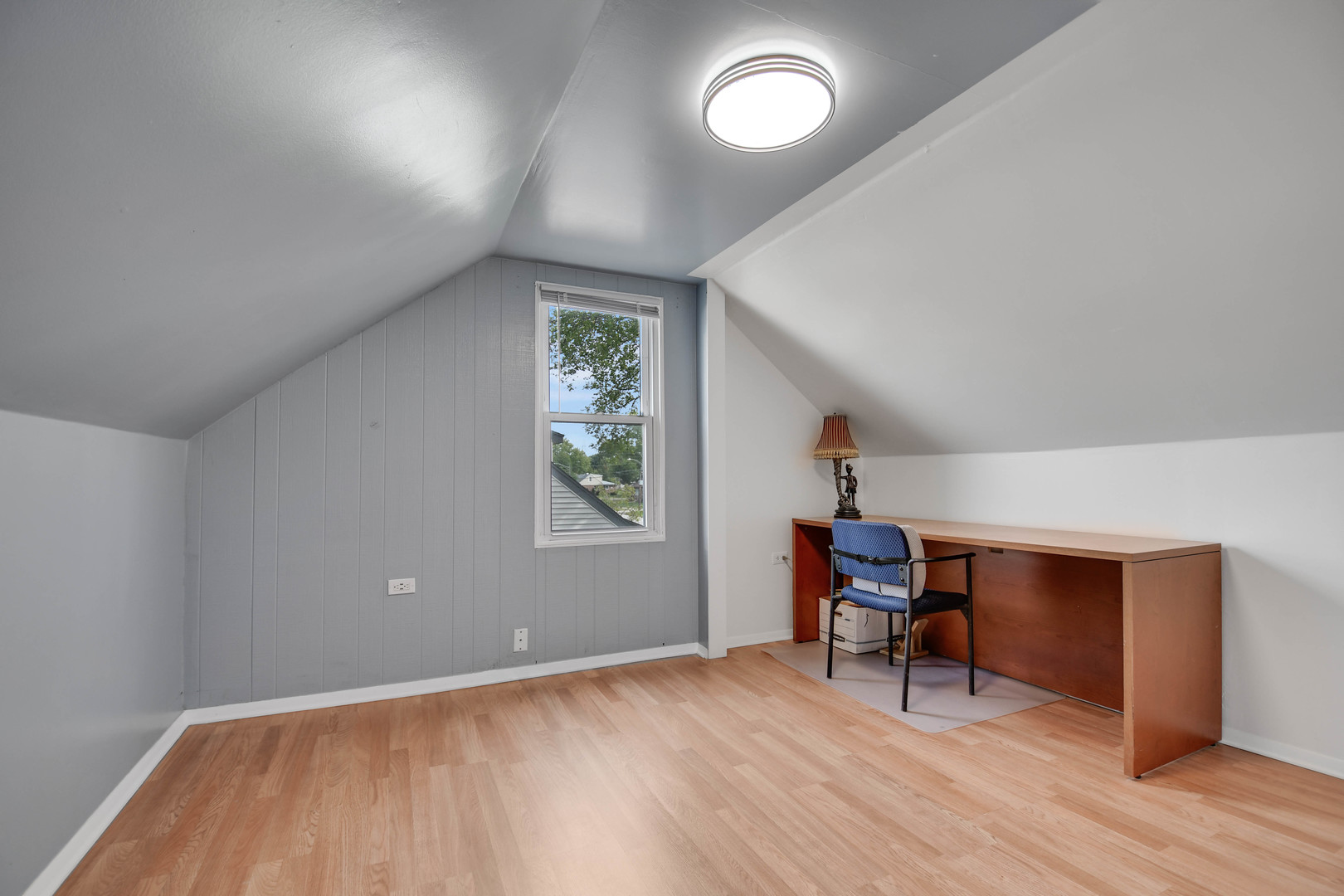 7828 Suburban Lane Bridgeview, IL 60455 - Photo 12 of 20 a view of room with hardwood floor and workspace