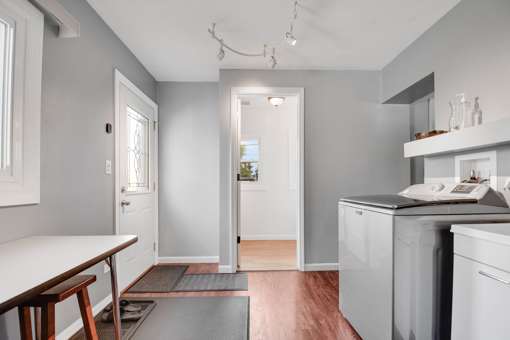 7828 Suburban Lane Bridgeview, IL 60455 - Photo 13 of 20 a room that has a sink and a stove in it