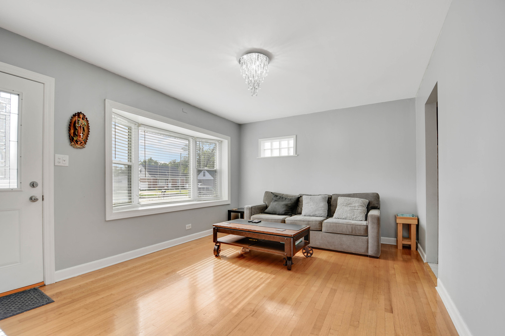 7828 Suburban Lane Bridgeview, IL 60455 - Photo 2 of 20 a living room with furniture and a window