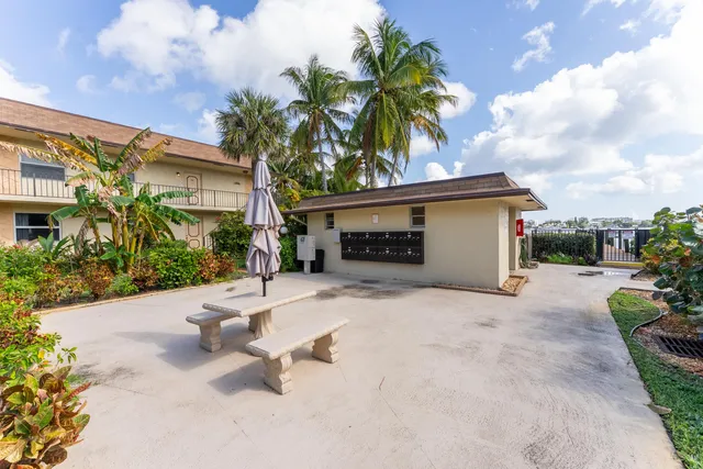 a view of a swimming pool with a patio