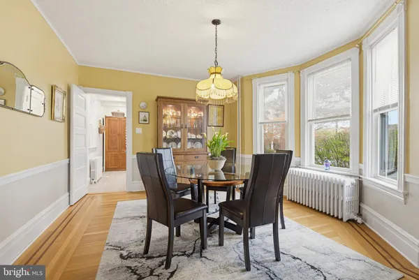 a kitchen with stainless steel appliances granite countertop a refrigerator and cabinets