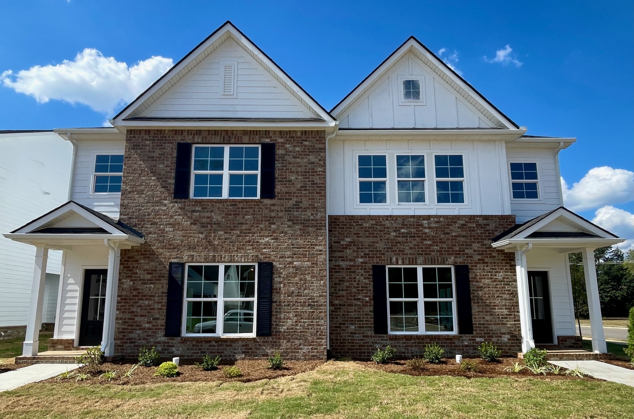 2114 Barringer Lane Murfreesboro, TN 37128 - Photo 1 of 17 a front view of a house with a yard and garage