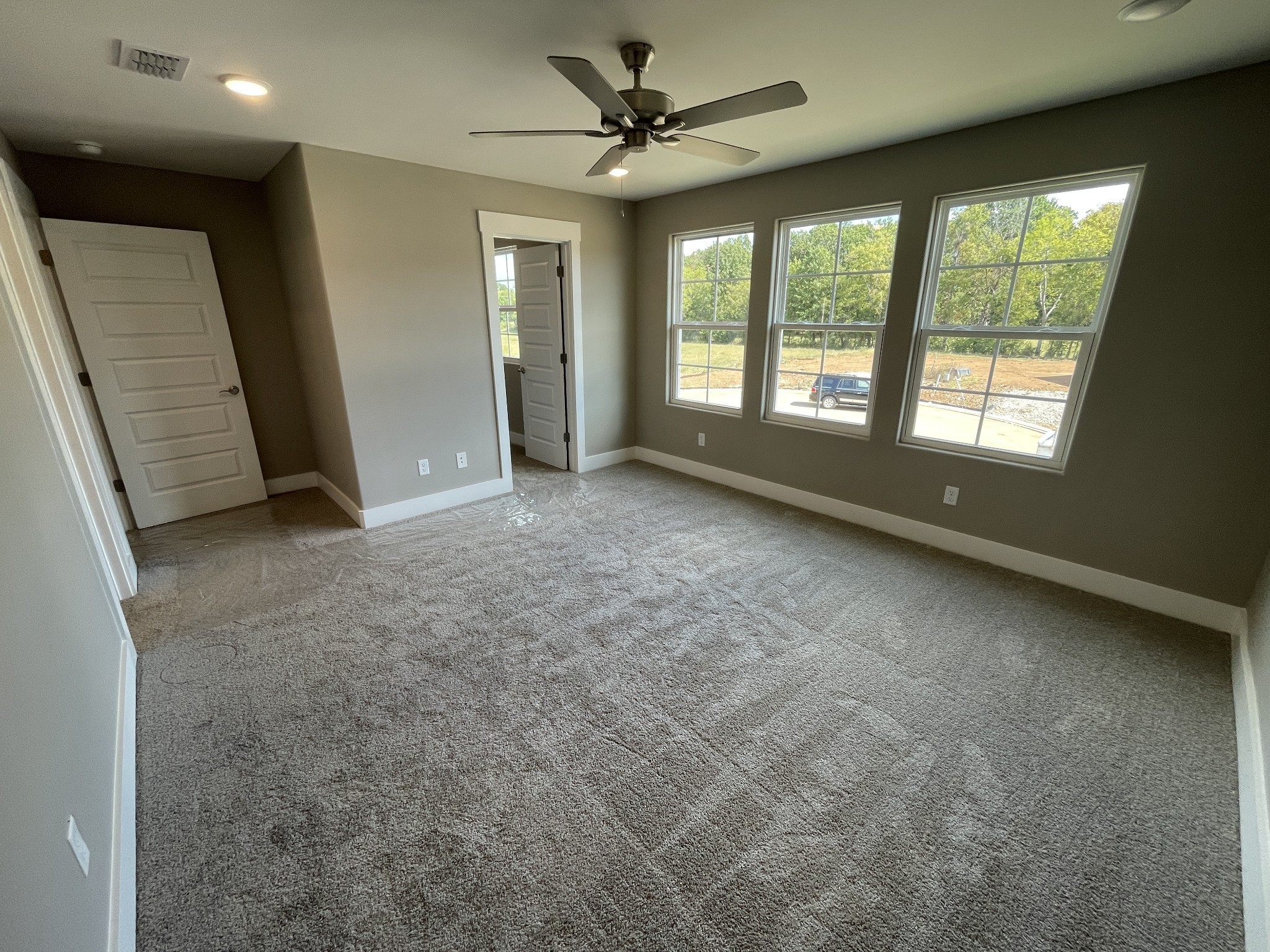 2114 Barringer Lane Murfreesboro, TN 37128 - Photo 10 of 17 an empty room with windows and fan