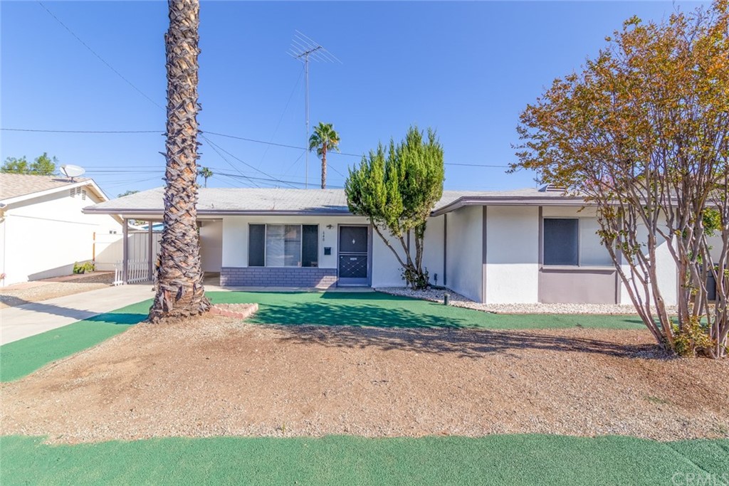 640 Snead Drive Hemet, CA 92543 - Photo 2 of 30 a front view of a house with garden