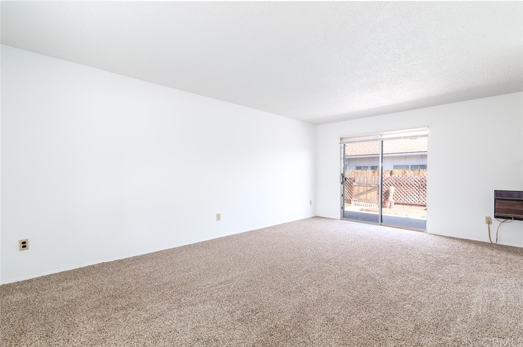 640 Snead Drive Hemet, CA 92543 - Photo 6 of 30 an empty room with windows