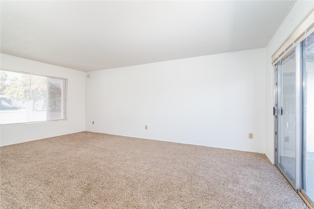 640 Snead Drive Hemet, CA 92543 - Photo 9 of 30 an empty room with windows