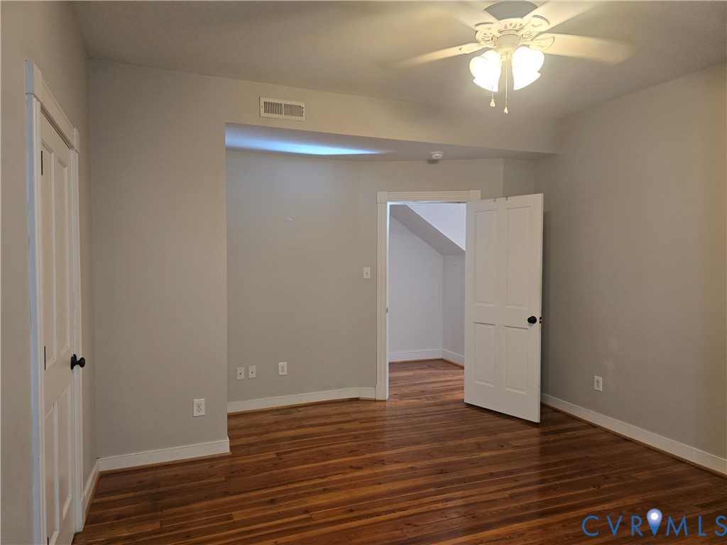 2106 Parkwood Avenue, Unit 1 Richmond, VA 23220 - Photo 15 of 20 a view of an empty room with wooden floor