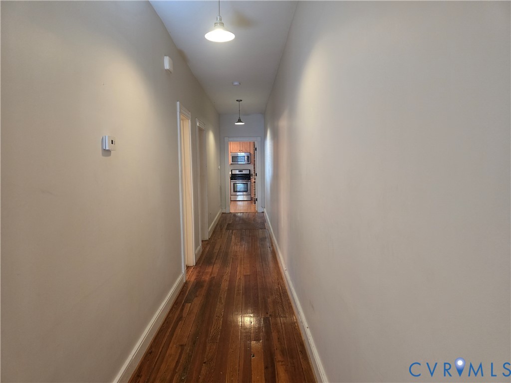 2106 Parkwood Avenue, Unit 1 Richmond, VA 23220 - Photo 8 of 20 a view of hallway with wooden floor