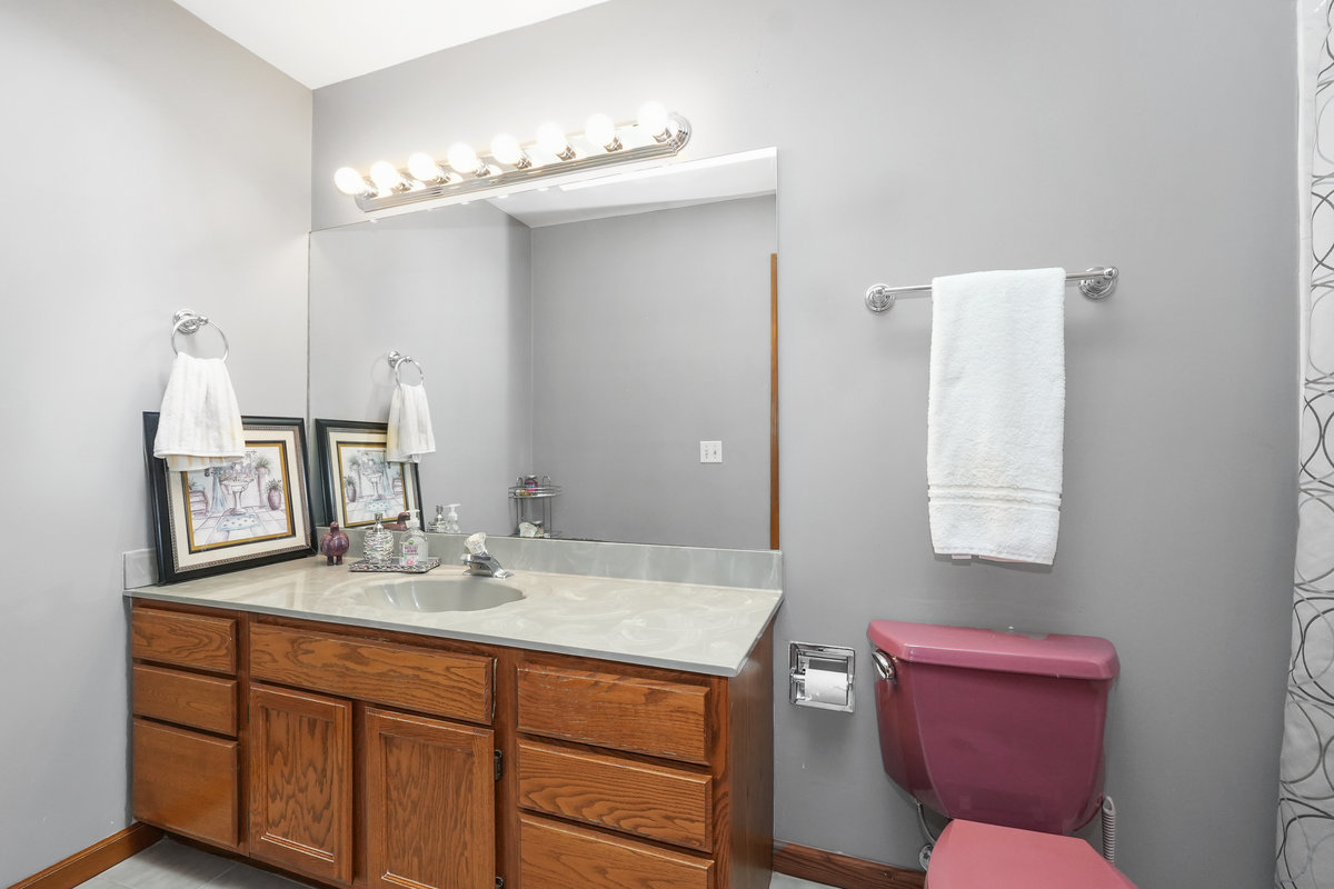 2 Valley View Drive Lemont, IL 60439 - Photo 22 of 36 a bathroom with a granite countertop toilet sink and mirror