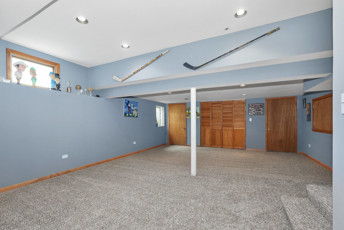 2 Valley View Drive Lemont, IL 60439 - Photo 27 of 36 a view of an empty room with window and stairs