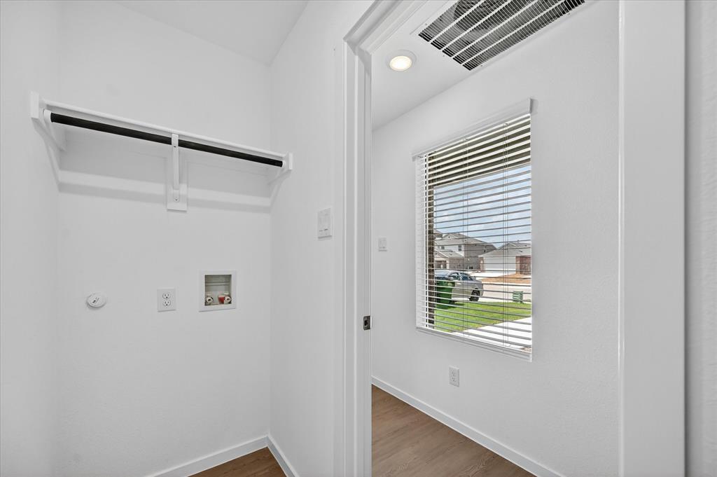 1516 Prince Road Howe, TX 75459 - Photo 10 of 28 a bathroom with a window and a shower