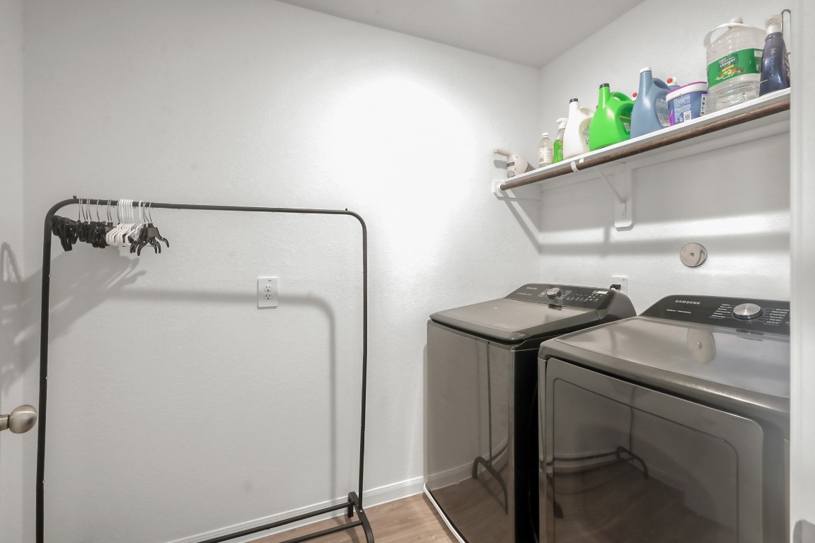 23562 Glenbuck Street Spring, TX 77373 - Photo 16 of 30 a utility room with dryer and washer