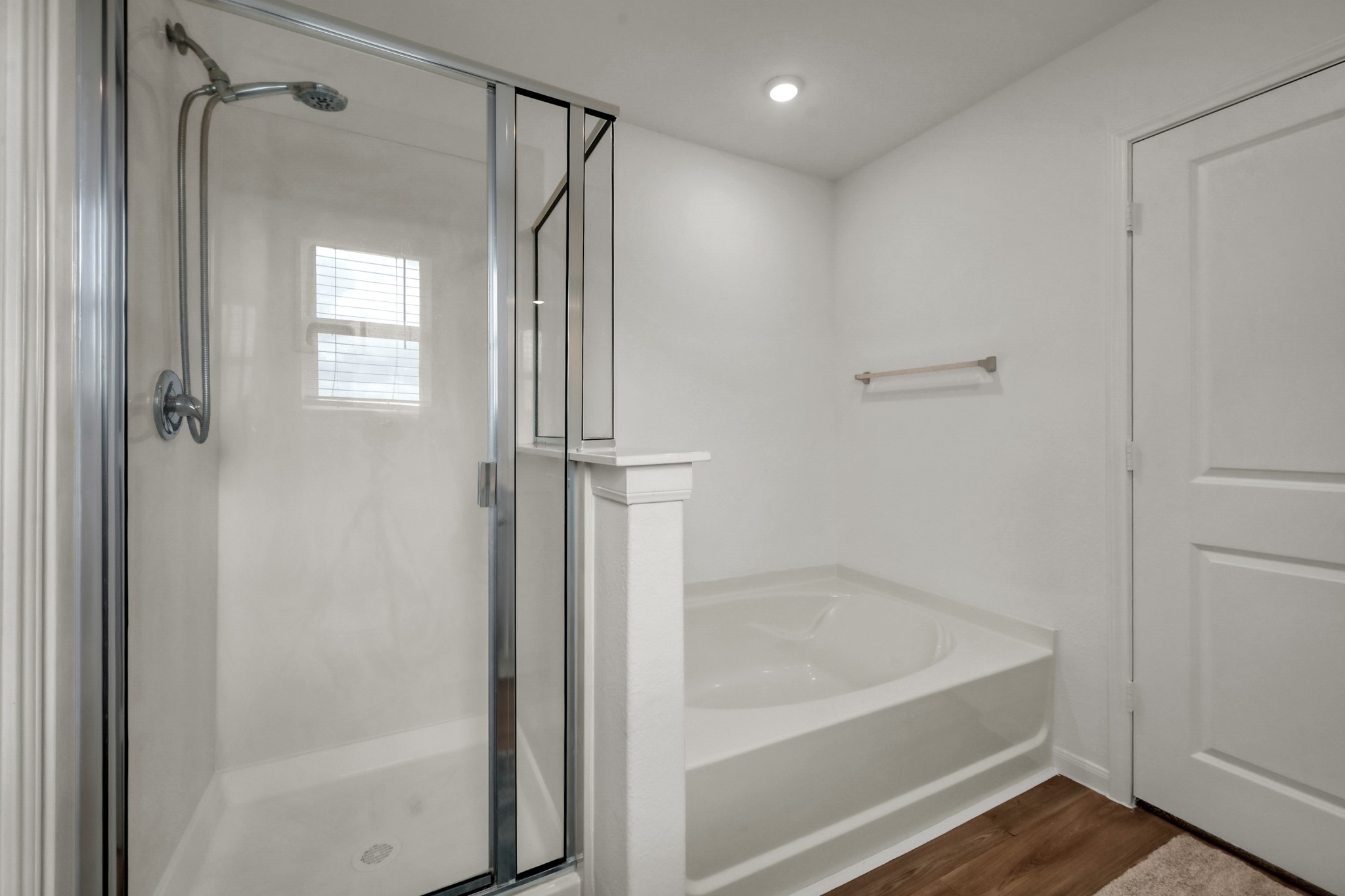 23562 Glenbuck Street Spring, TX 77373 - Photo 20 of 30 a bathroom with a bathtub and a shower