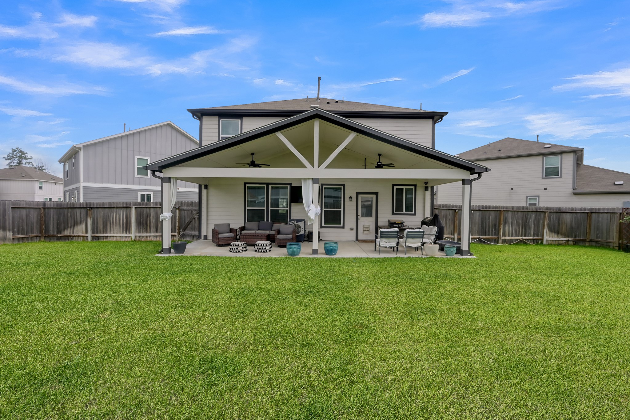23562 Glenbuck Street Spring, TX 77373 - Photo 2 of 30 a view of a house with a yard patio and dining space