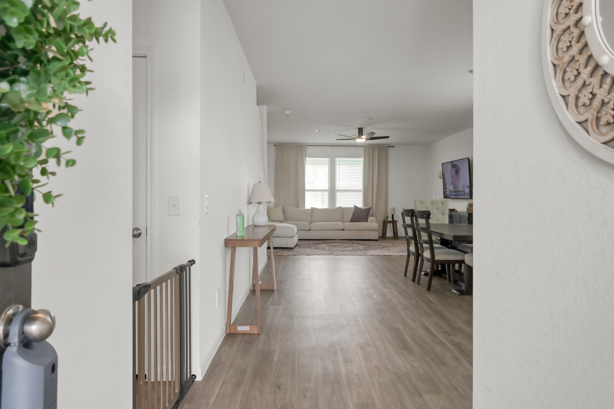 23562 Glenbuck Street Spring, TX 77373 - Photo 3 of 30 wooden floor in an empty room with a window