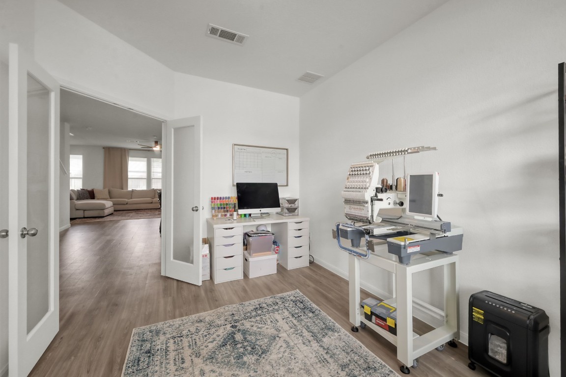 23562 Glenbuck Street Spring, TX 77373 - Photo 5 of 30 a view of a livingroom with furniture and a flat screen tv
