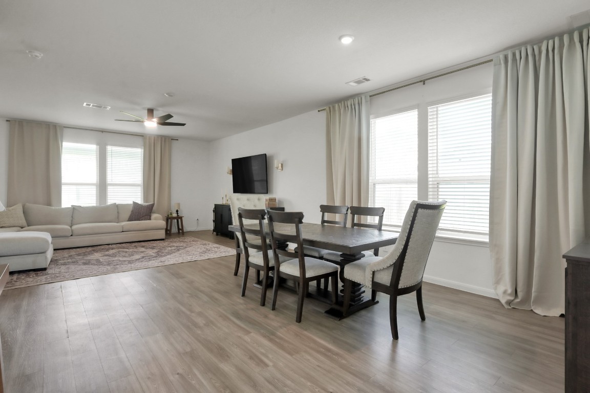 23562 Glenbuck Street Spring, TX 77373 - Photo 6 of 30 a view of a dining room with furniture and a window