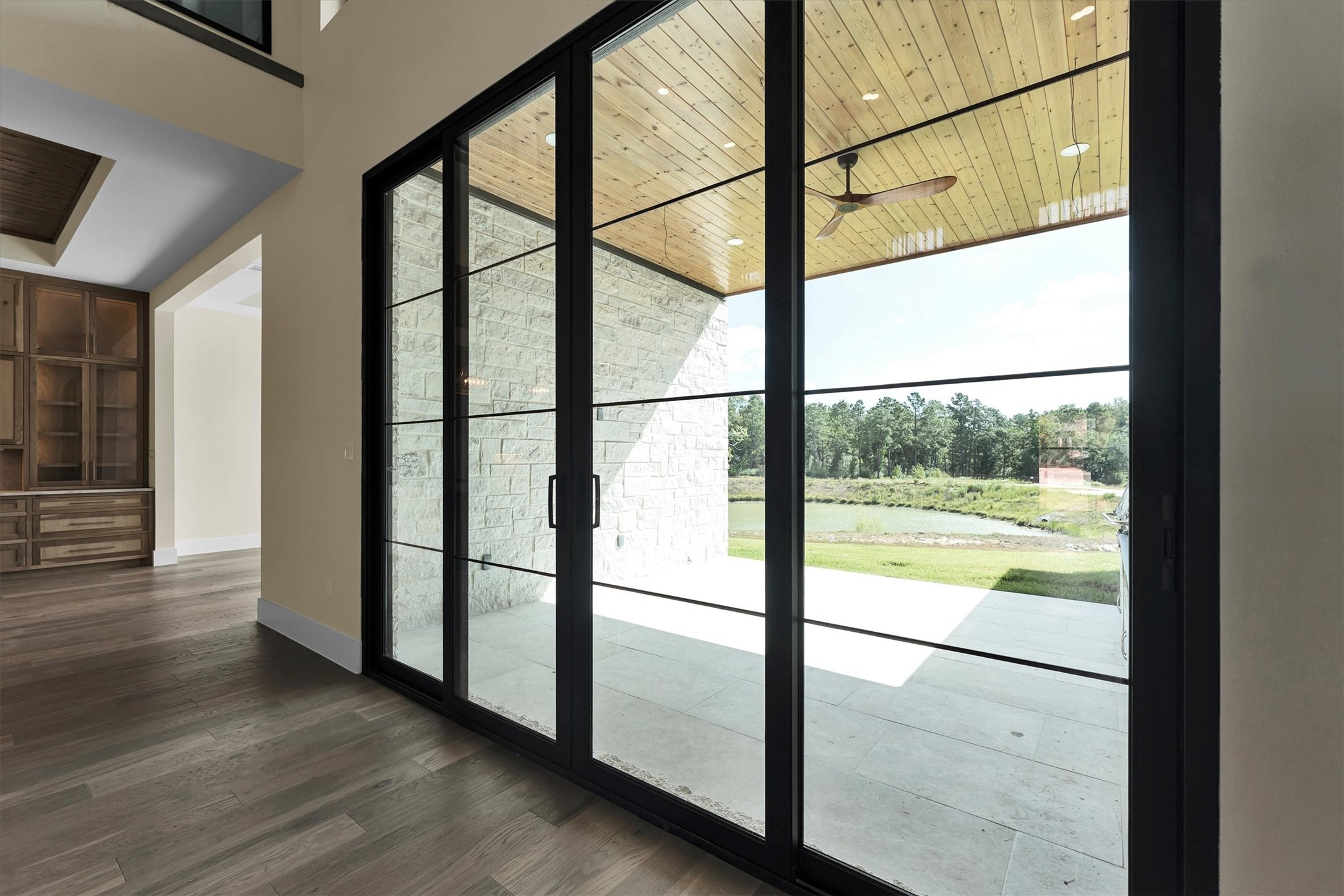 23701 Birch Grove Road Montgomery, TX 77316 - Photo 19 of 50 A view from living area to the backyard and pond view