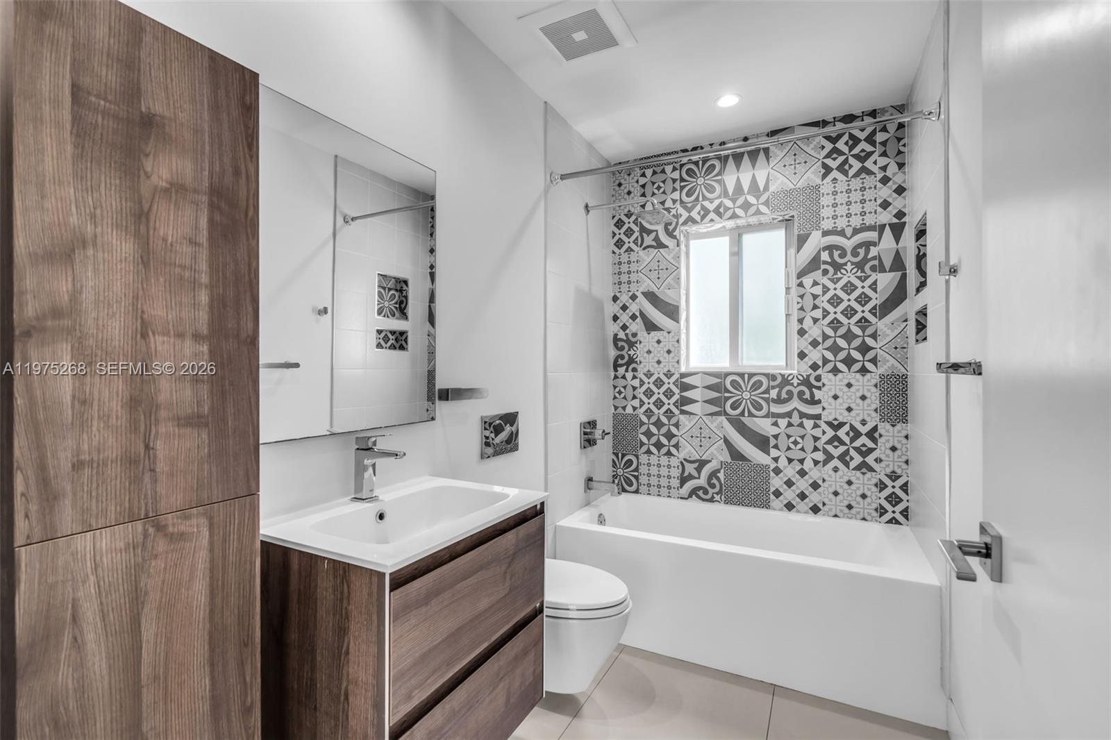 1632 Southwest 12th Street Miami, FL 33135 - Photo 28 of 43 a bathroom with a sink toilet and shower
