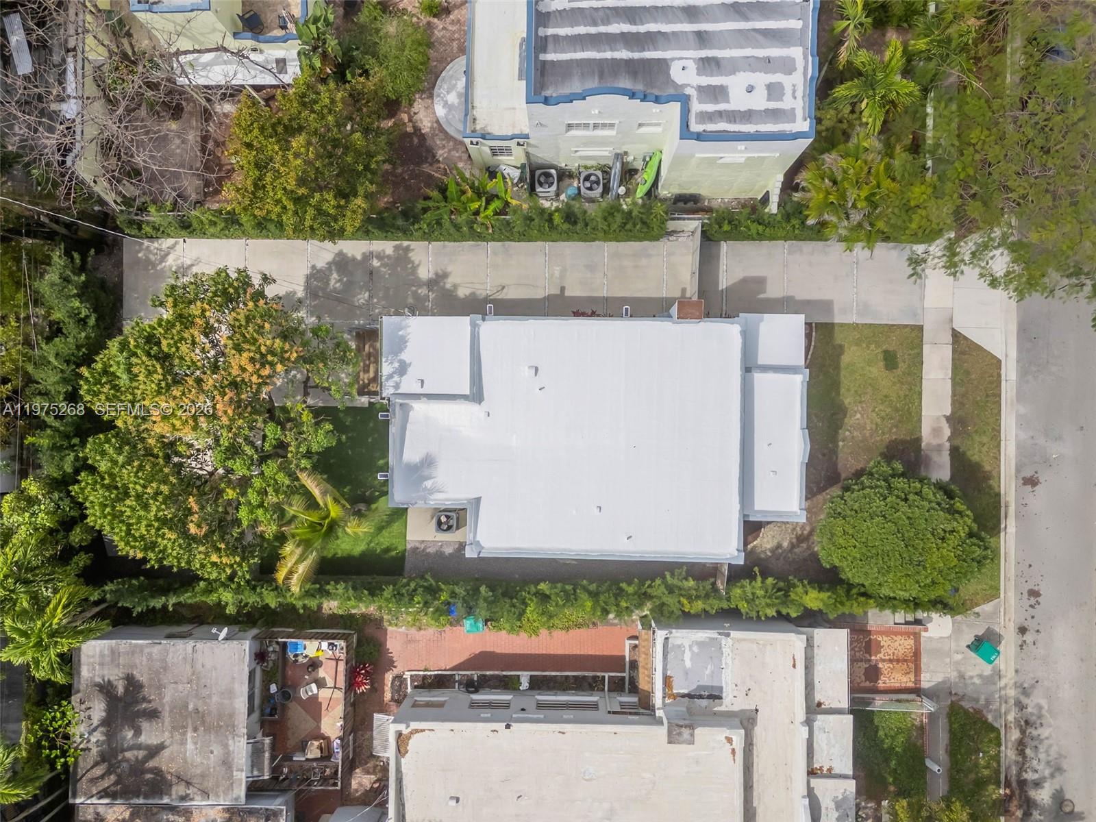 1632 Southwest 12th Street Miami, FL 33135 - Photo 43 of 43 aerial view of a house with a garden and large trees