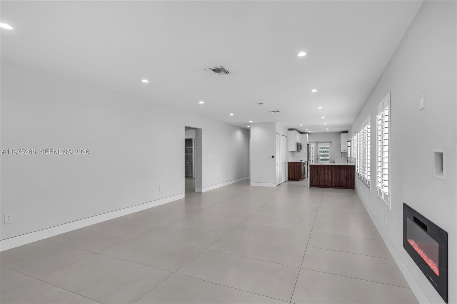 1632 Southwest 12th Street Miami, FL 33135 - Photo 9 of 43 a view of a big room with a kitchen
