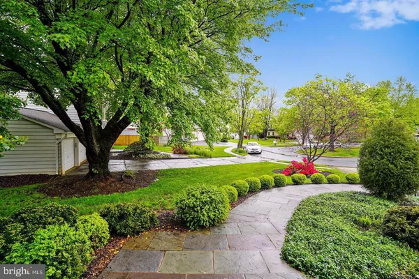 a view of a garden with a fountain