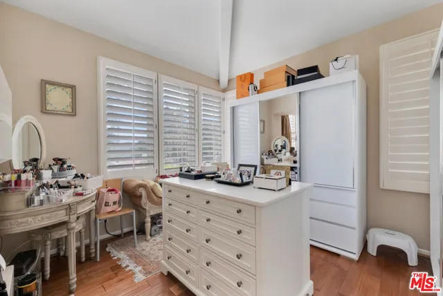 a kitchen with stainless steel appliances kitchen island granite countertop a sink and cabinets
