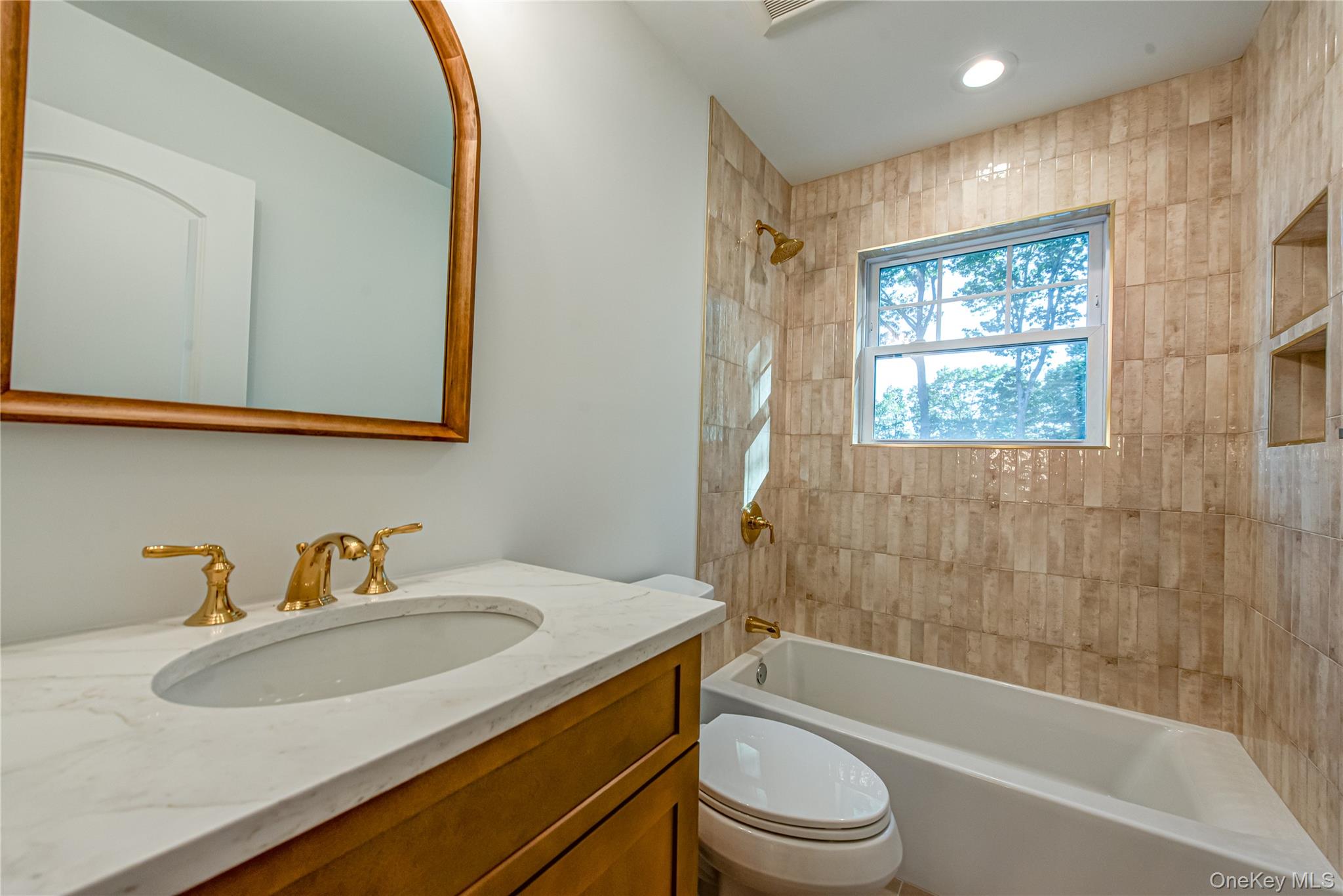 64 Blydenburgh Road Centereach, NY 11720 - Photo 35 of 44 Full bathroom with vanity, tub / shower combination, and recessed lighting. For Marketing Purposes!