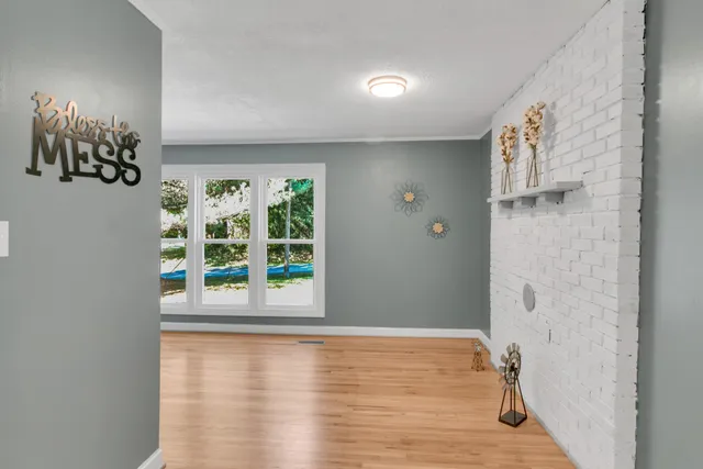 a kitchen with stainless steel appliances a refrigerator sink and cabinets