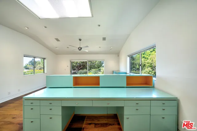 a bathroom with a tub sink and window