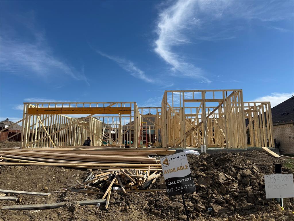 208 Shepards Street Godley, TX 76044 - Photo 2 of 2 a view of a back yard of the house