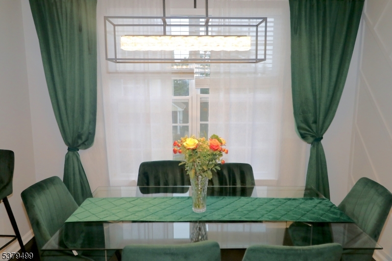 163 Conover Terrace, Unit 163 Lebanon, NJ 08833 - Photo 15 of 15 a room with furniture and a potted plant