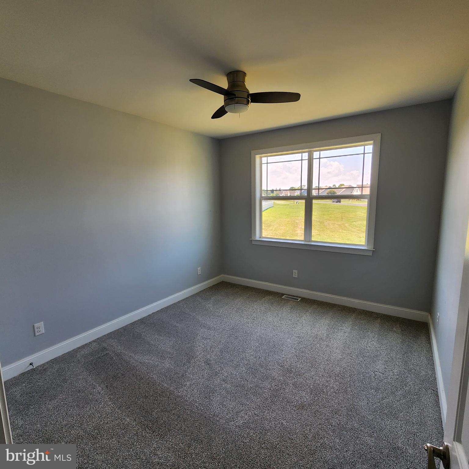15050 Sandpiper Road Milton, DE 19968 - Photo 18 of 25 an empty room with a window