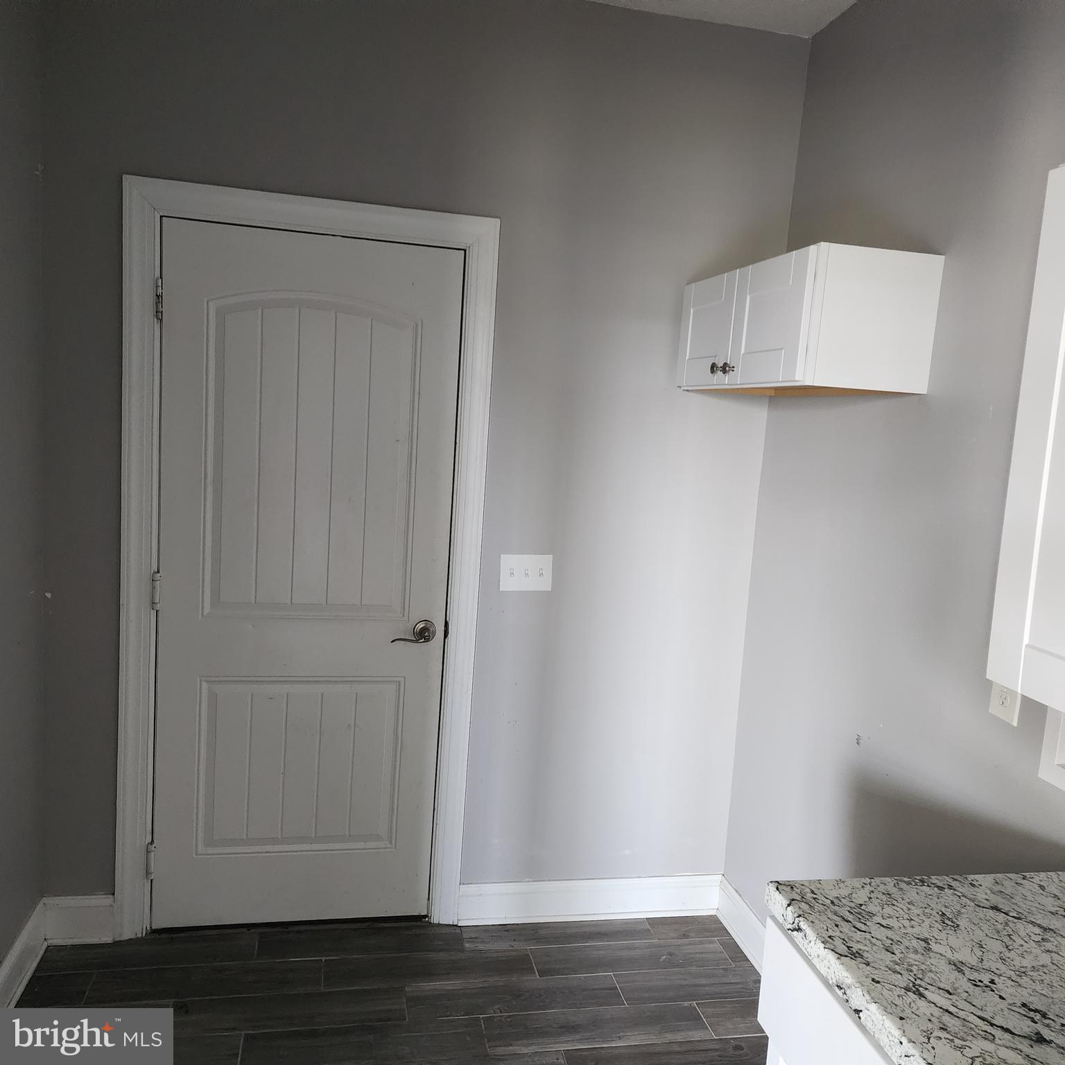 15050 Sandpiper Road Milton, DE 19968 - Photo 19 of 25 a view of room with wooden floor and cabinet