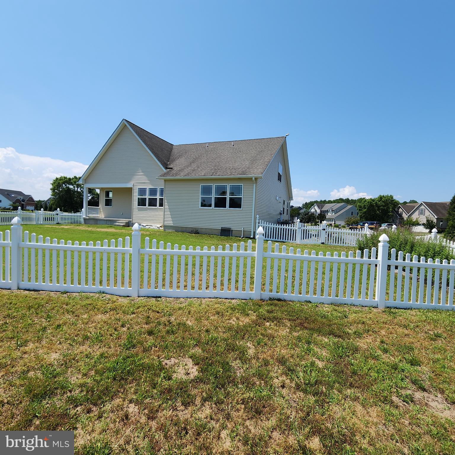 15050 Sandpiper Road Milton, DE 19968 - Photo 3 of 25 a front view of a house with a garden