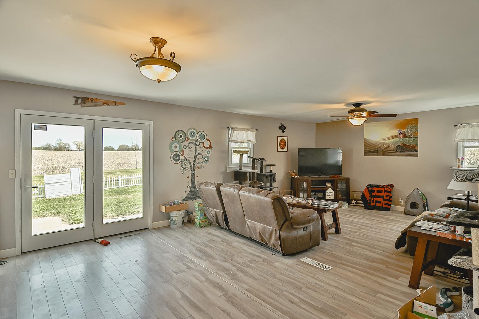 9563 East Center Road Stockton, IL 61085 - Photo 6 of 24 a living room with furniture and a large window