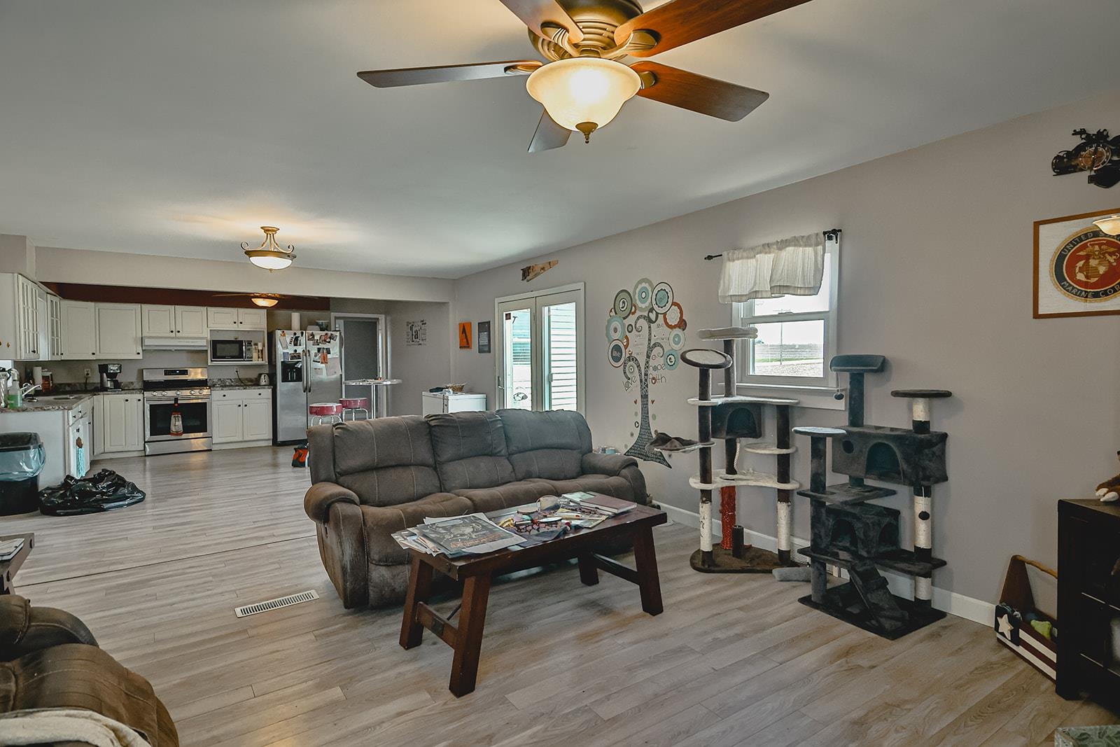 9563 East Center Road Stockton, IL 61085 - Photo 8 of 24 a living room with furniture and a wooden floor
