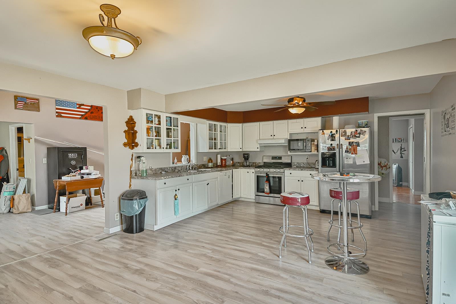 9563 East Center Road Stockton, IL 61085 - Photo 9 of 24 a kitchen with stainless steel appliances granite countertop a stove and cabinets