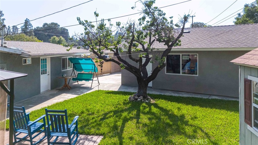 301 West Ashby Street Azusa, CA 91702 - Photo 18 of 75 a front view of a house with garden