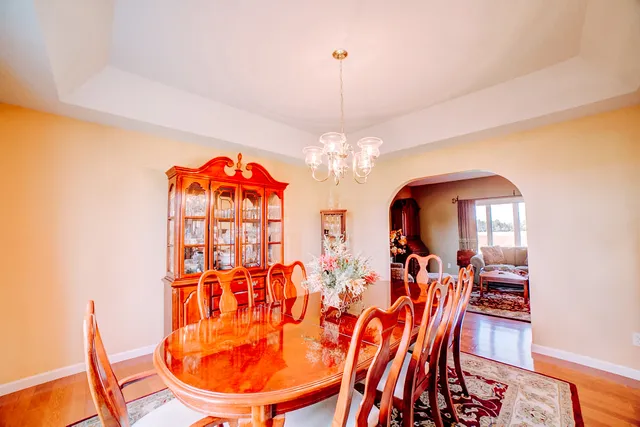 a kitchen with stainless steel appliances granite countertop sink stove top oven and refrigerator