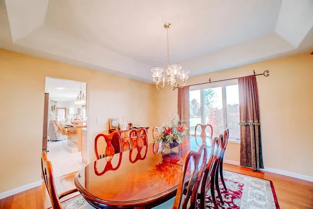 a living room with furniture toys and a flat screen tv