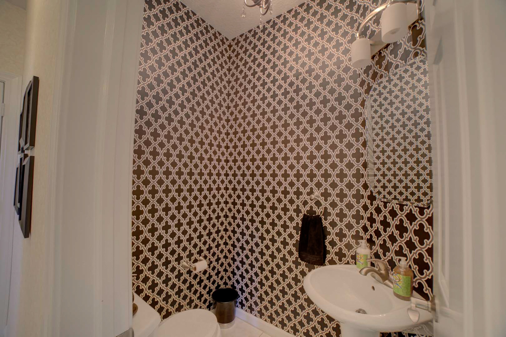 23 2130 East Watseka, IL 60970 - Photo 18 of 41 a bathroom with a toilet and a shower curtain